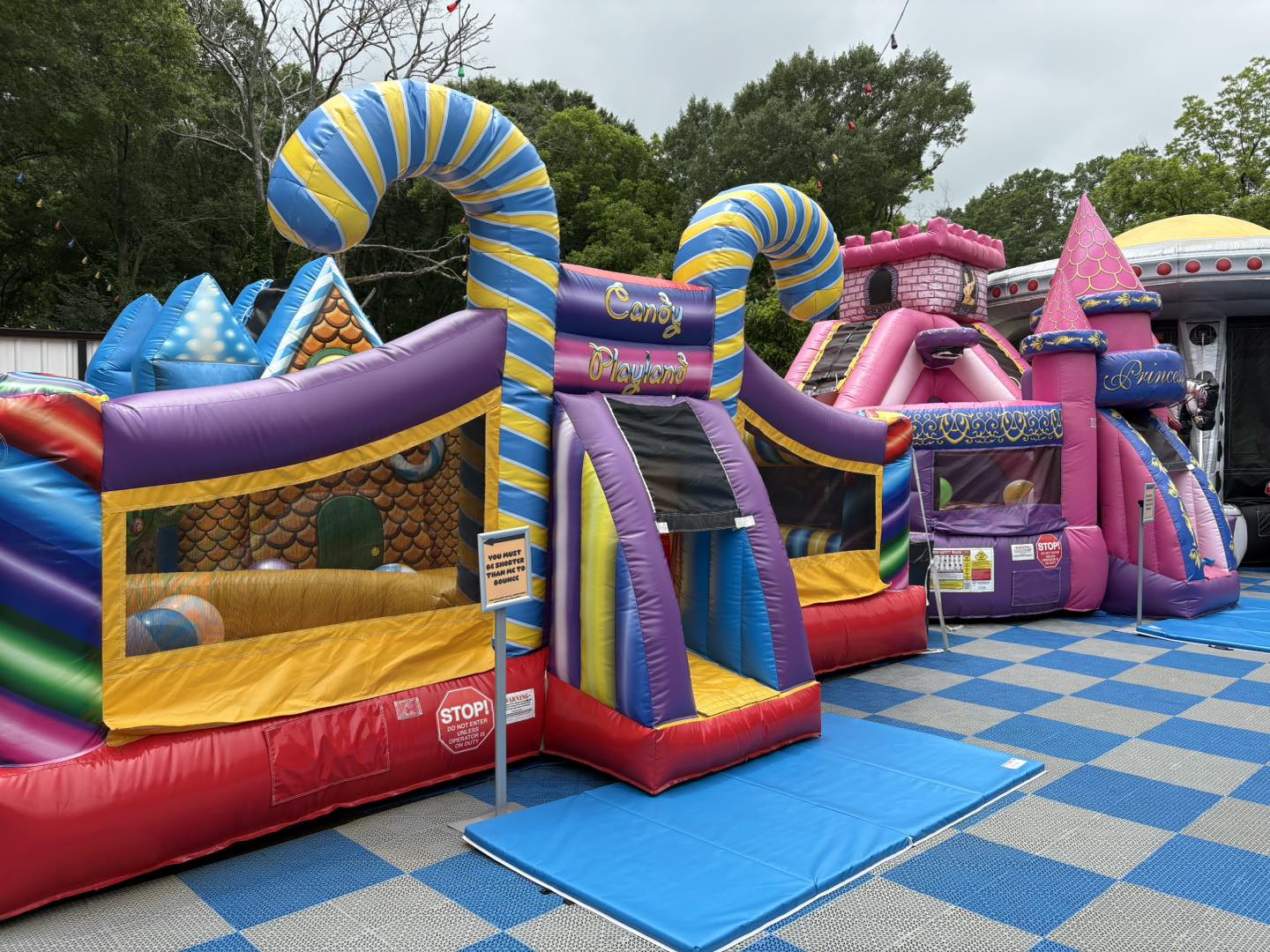 Pink inflatable bouncy castle party setup